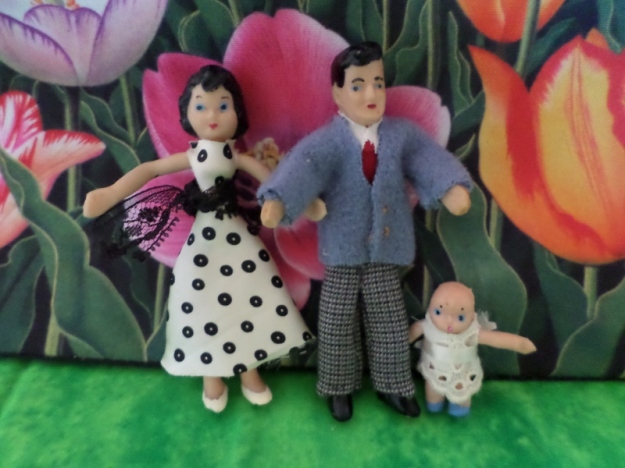 Rubber doll Family redressed